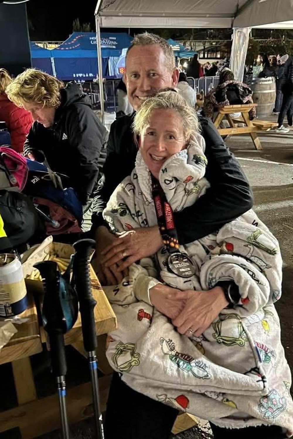 Meg wrapped up at a checkpoint during the UTA 100 miler