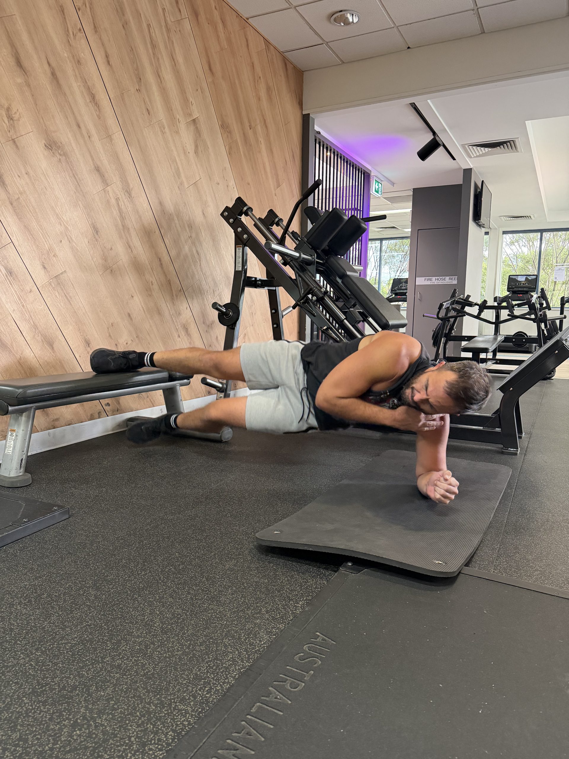 Brad working through a machine leg exercise