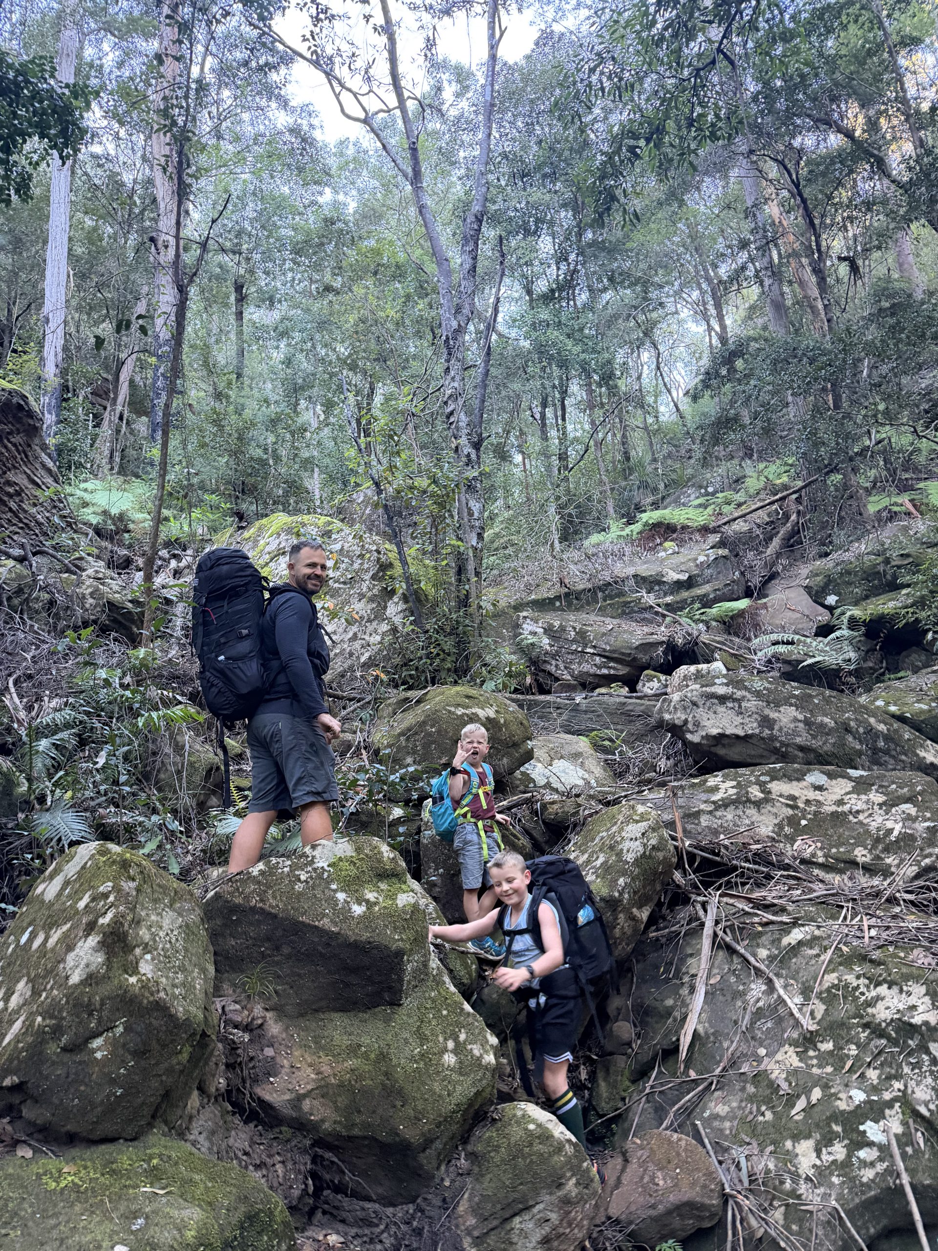 Picking a way down through the boulders on the trail