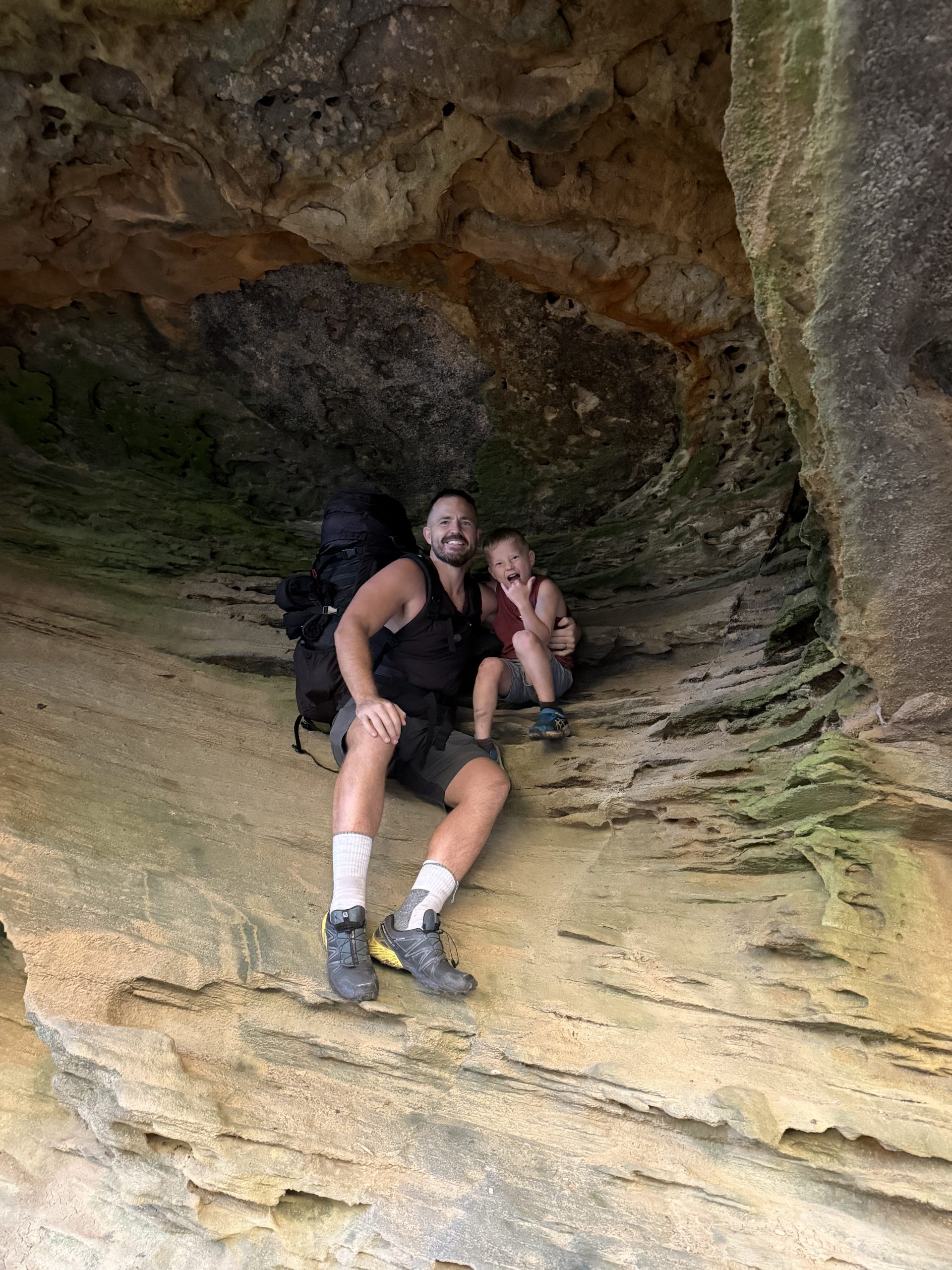 Taking a break on the rock ledge during the hike