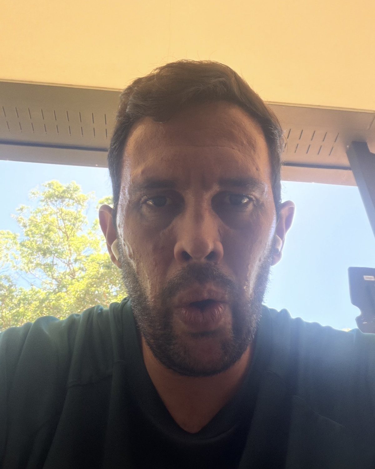 Sweaty selfie of Berdo catching his breath after a hard interval session